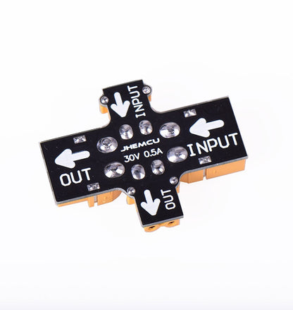 Underside of JHEMCU RC smoke stopper showing INPUT/OUT arrows and 30V 0.5A marking