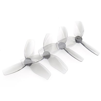 HQProp DT76MMX3 V2 76mm 3-blade polycarbonate cinewhoop propellers in smoke gray, angled view
