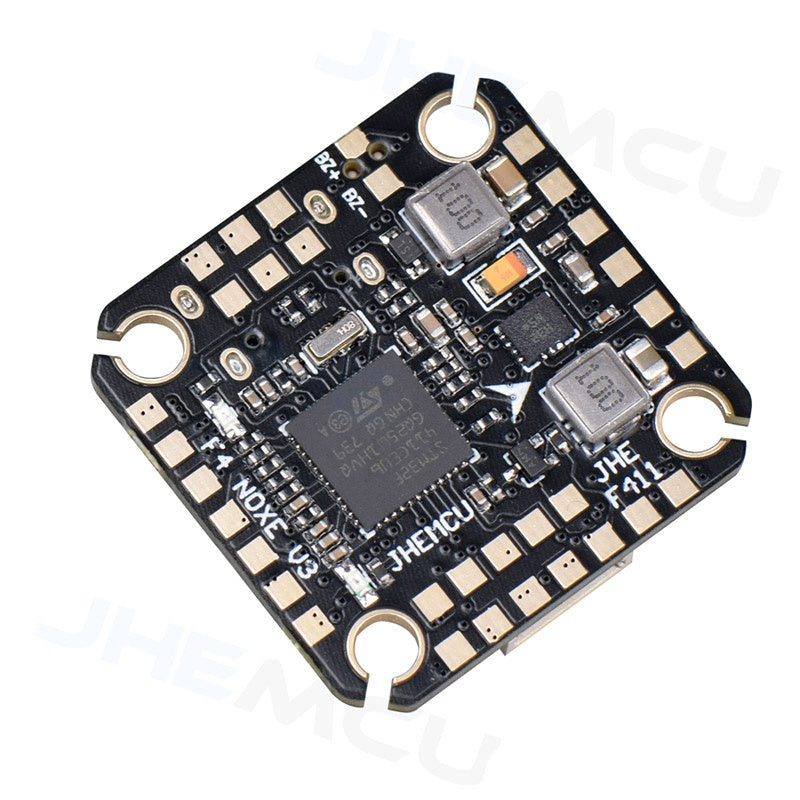 JHEMCU F4 NOXE V3 STM32F411 flight controller PCB, angled top view with solder pads and mounting holes