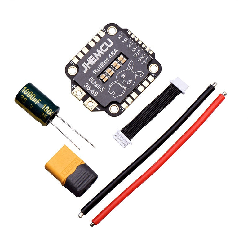 Included accessories: capacitor, XT60 plug, power wires, and ESC-to-FC ribbon cable with RuiBet ESC