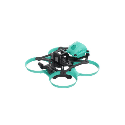 Angled view of assembled micro quad frame with teal duct guards and front camera mount