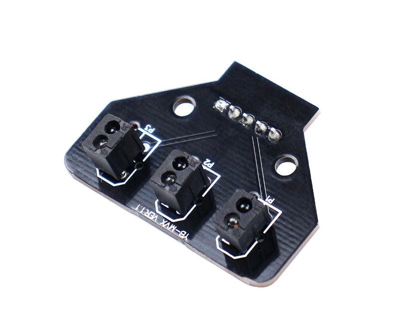 Top-down angled view of the 3-sensor tracking PCB with mounting holes and trace markings