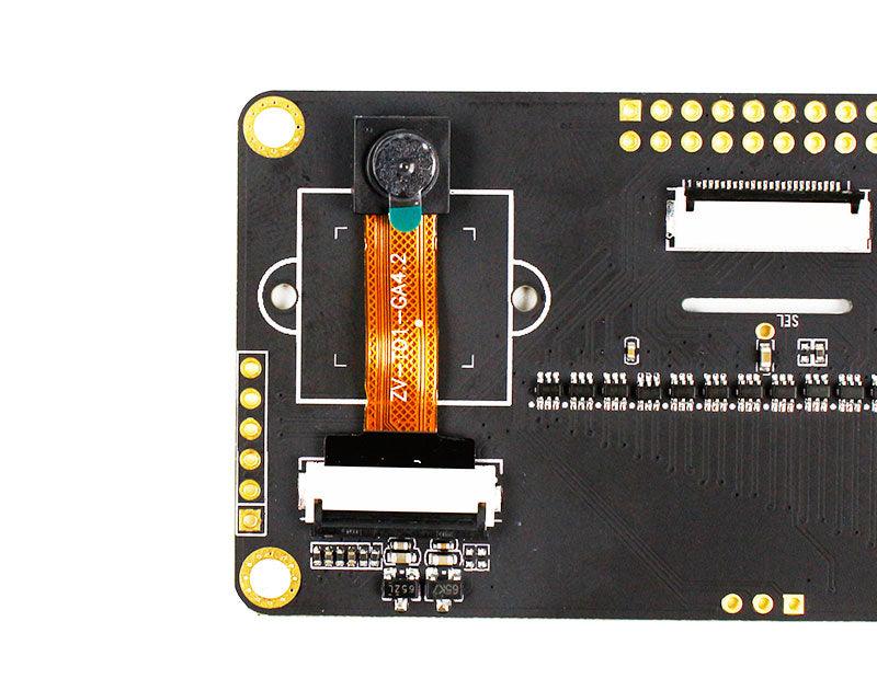 Close-up of one camera module and FPC ribbon connector on the dual camera PCB