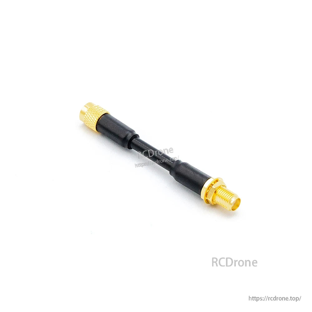 Close view of SMA male bulkhead connector and SMA female end on short extension cable