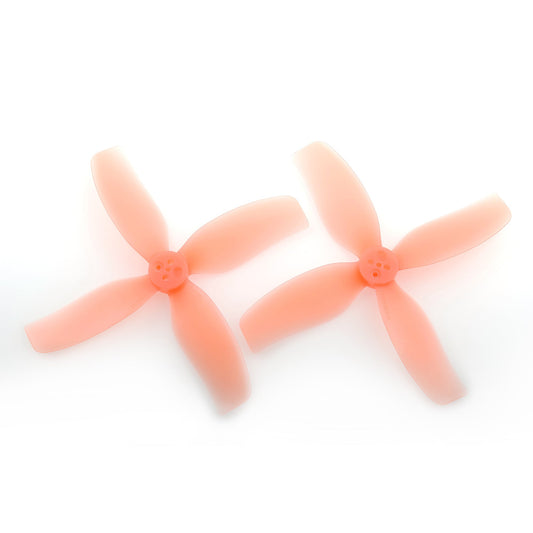 HQProp DT90MMX4 90mm 4-blade cinewhoop propellers in translucent orange, pair on white