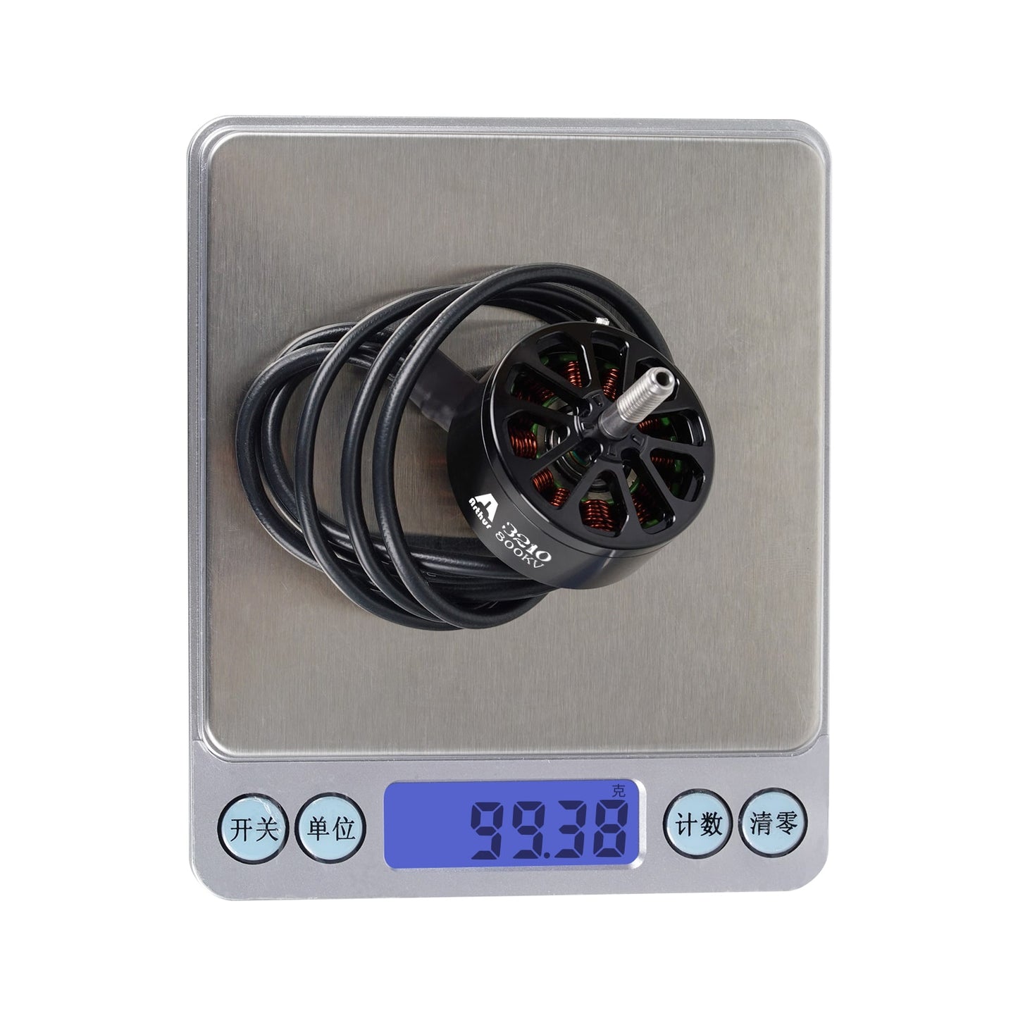 Flashhobby A3210 800KV brushless motor with long lead wires, sitting on a digital scale reading 99.38 g