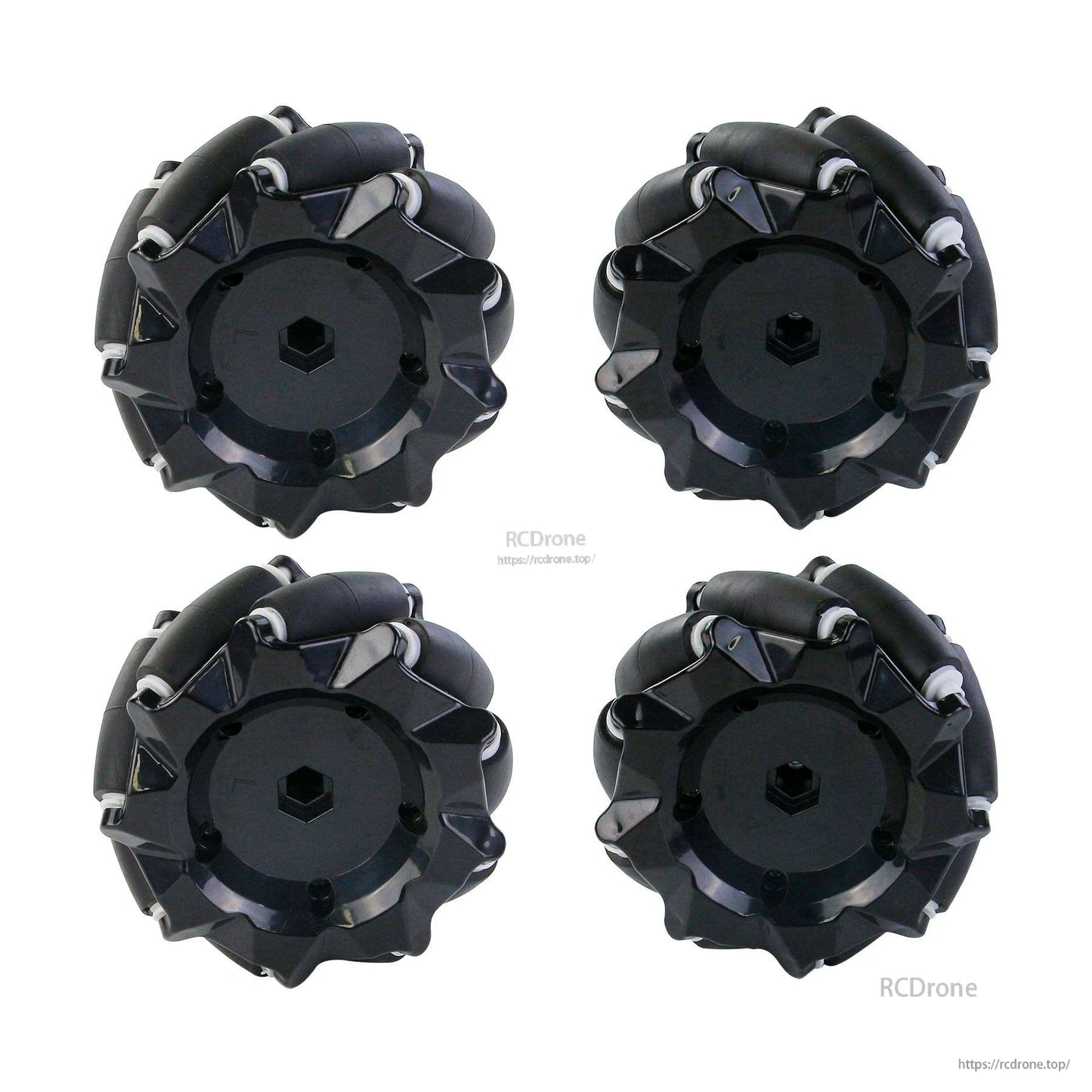 Set of four black mecanum wheels with hex hub center, top view arrangement