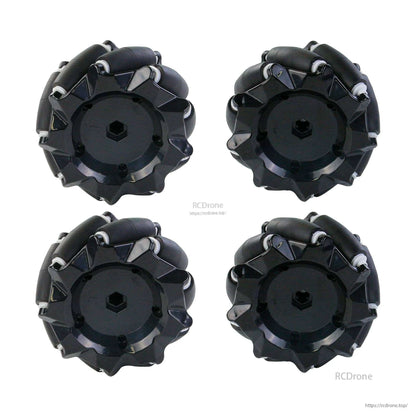 Set of four black mecanum wheels with hex hub center, top view arrangement