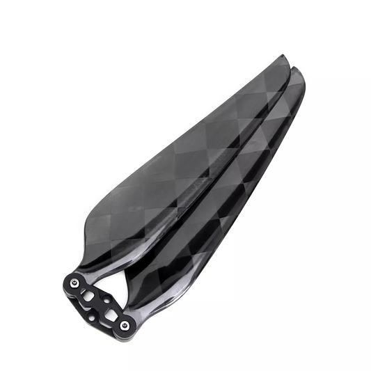 Glossy carbon fiber folding propeller blade set with black checkered weave, paired blades folded together
