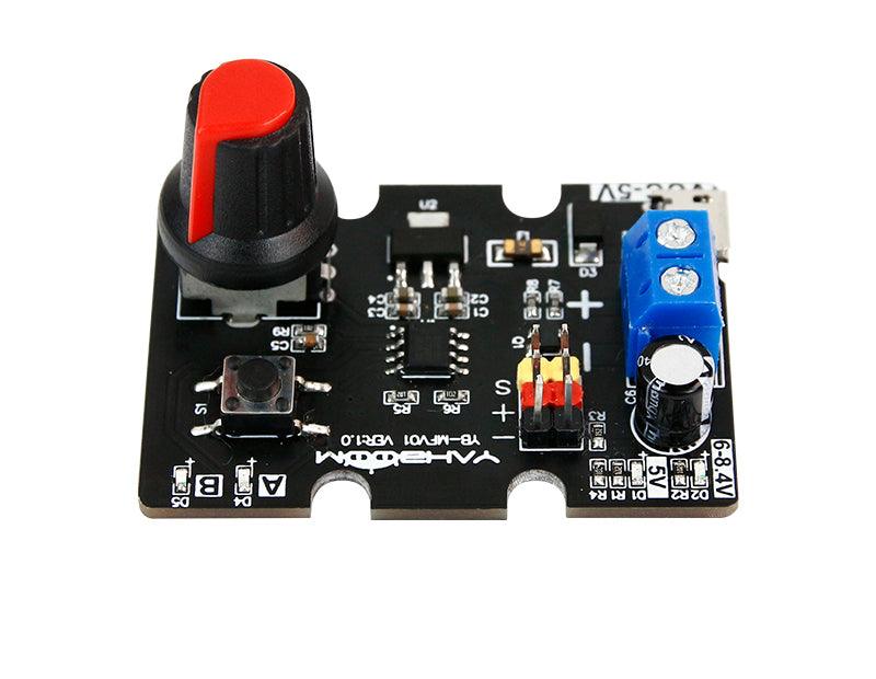 Angled view of Yahboom dual PWM servo controller board showing rotary knob, push button, and screw terminal
