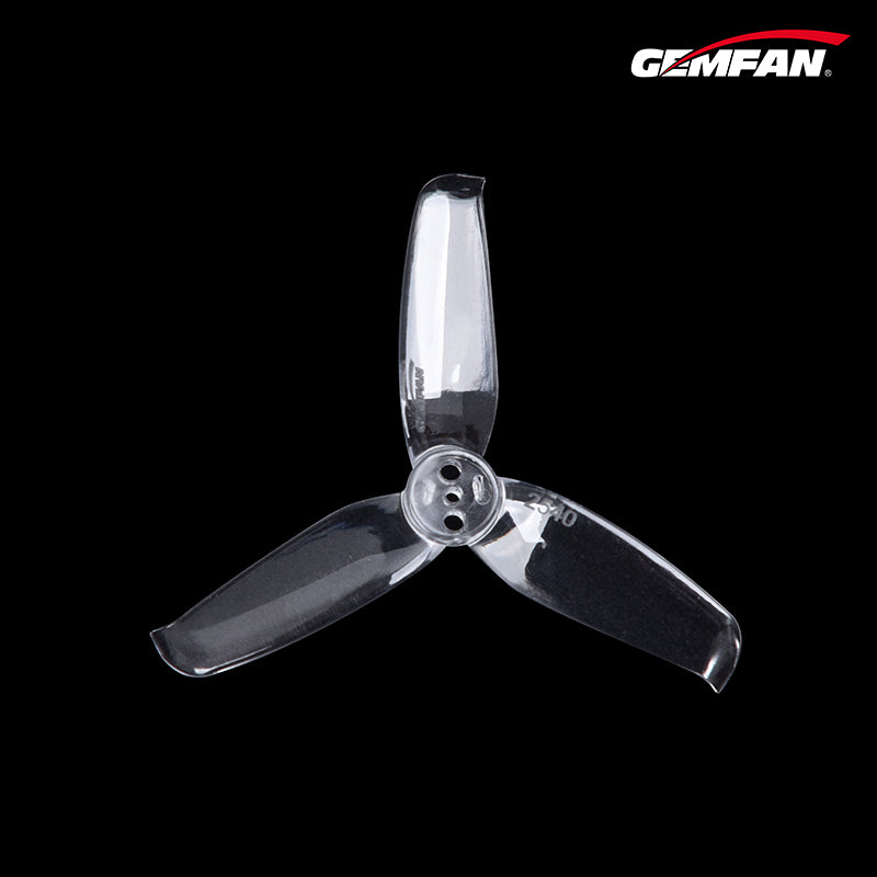 Transparent smoke-black 3-blade propeller close view, center hub with 3 mounting holes