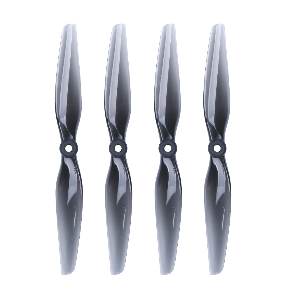 HQProp 7x4.5 light grey polycarbonate propeller set, four blades shown on white background