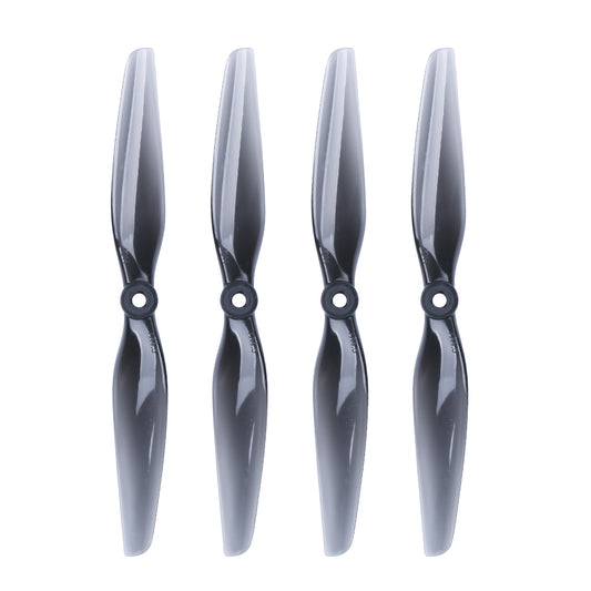 HQProp 7x4.5 light grey polycarbonate propeller set, four blades shown on white background