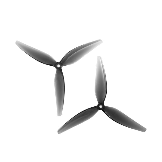 HQProp 7x5.5x3 grey polycarbonate 3-blade propellers, pair shown on white background