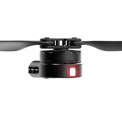 MAD 7X-10 135KV Drone Arm, Close-up of a drone brushless motor with two-blade propeller and red status light on the housing