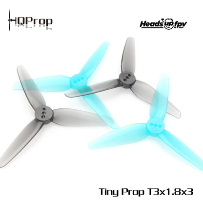 Tiny Prop T3x1.8x3 propeller set shown in smoke gray and blue, 3-blade design with 2mm mounting hole