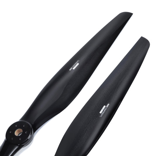 Pair of glossy black carbon fiber paramotor propeller blades with hub, CW and CCW set