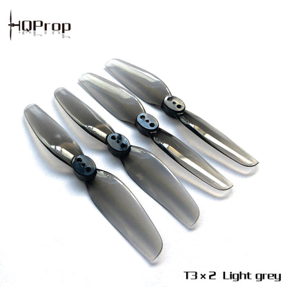 HQProp T3X2 propellers in light grey color, four 2-blade props shown with HQProp logo