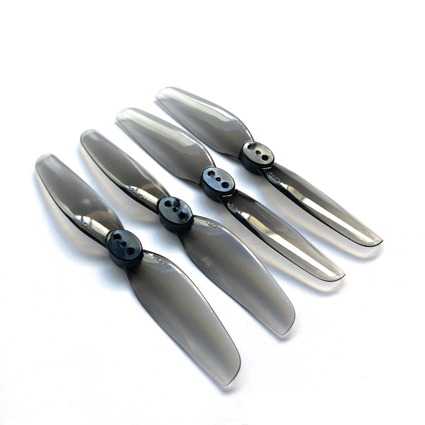 HQProp T3X2 polycarbonate propeller set with four 2-blade props and three-hole hubs