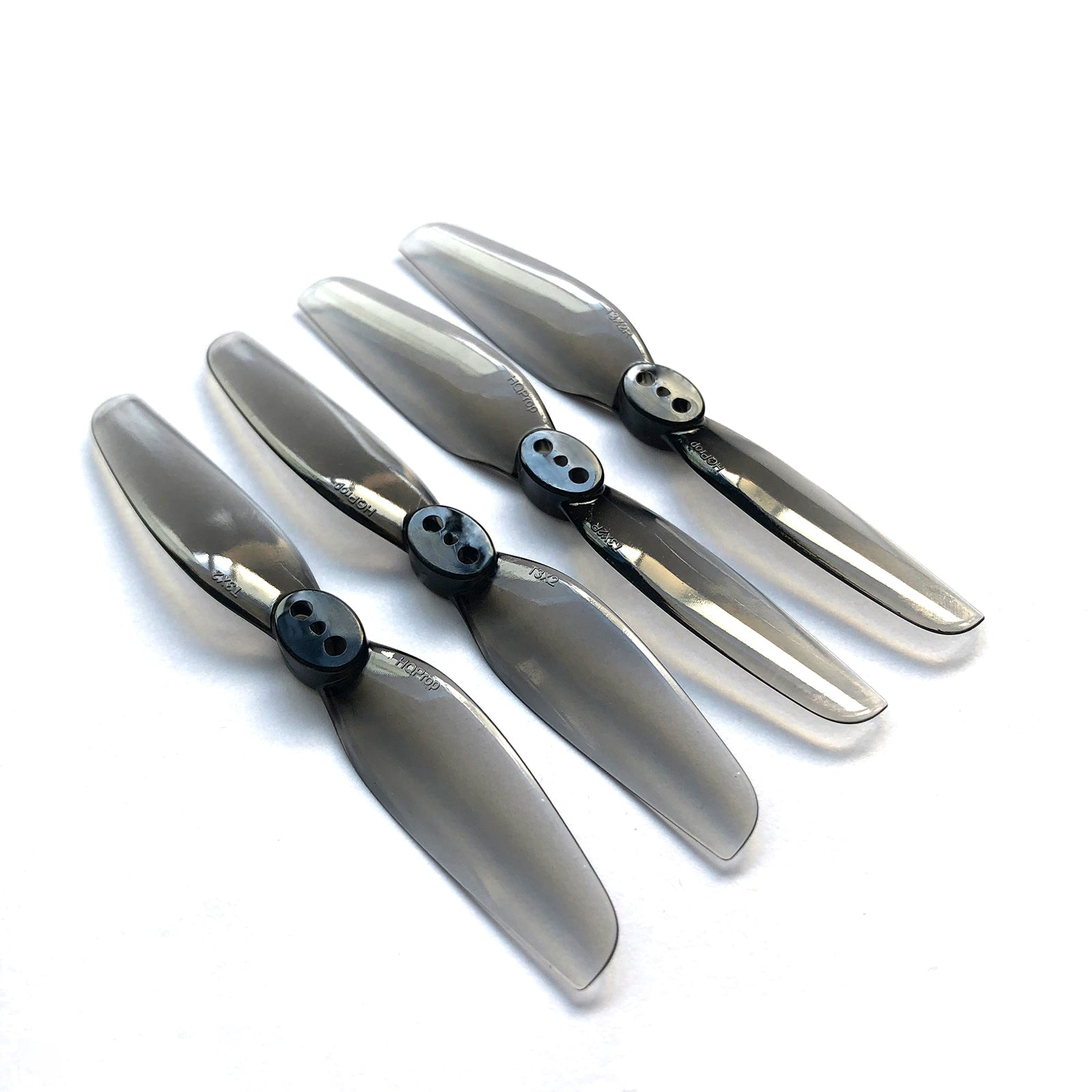 HQProp T3X2 polycarbonate propeller set with four 2-blade props and three-hole hubs