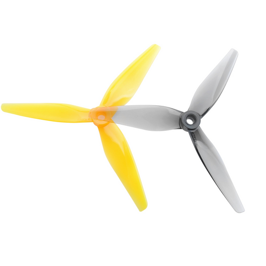 HQProp 5131 (R31) polycarbonate 3-blade propellers, yellow and grey close-up showing hubs