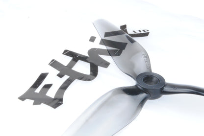 Close-up of HQProp Ethix S5 light grey 3-blade propeller hub and Ethix logo on blade