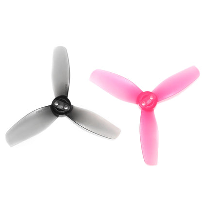 HQProp T3X3.2X3 Propeller set shown in two colors, gray and translucent pink tri-blade props