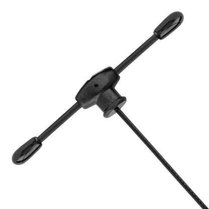 Close-up of T-shaped antenna head and strain relief on coax cable