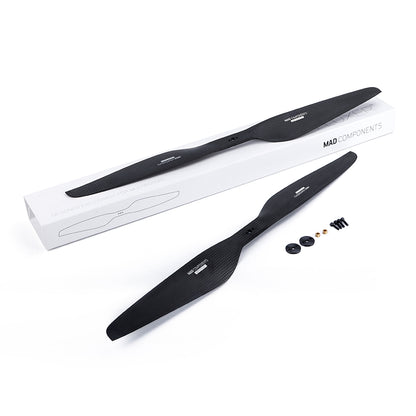 MAD FLUXER Pro 20x6.0 Carbon Fiber Propeller, MAD FLUXER Pro carbon fiber propeller set with two black blades, mounting hardware, and MAD Components box