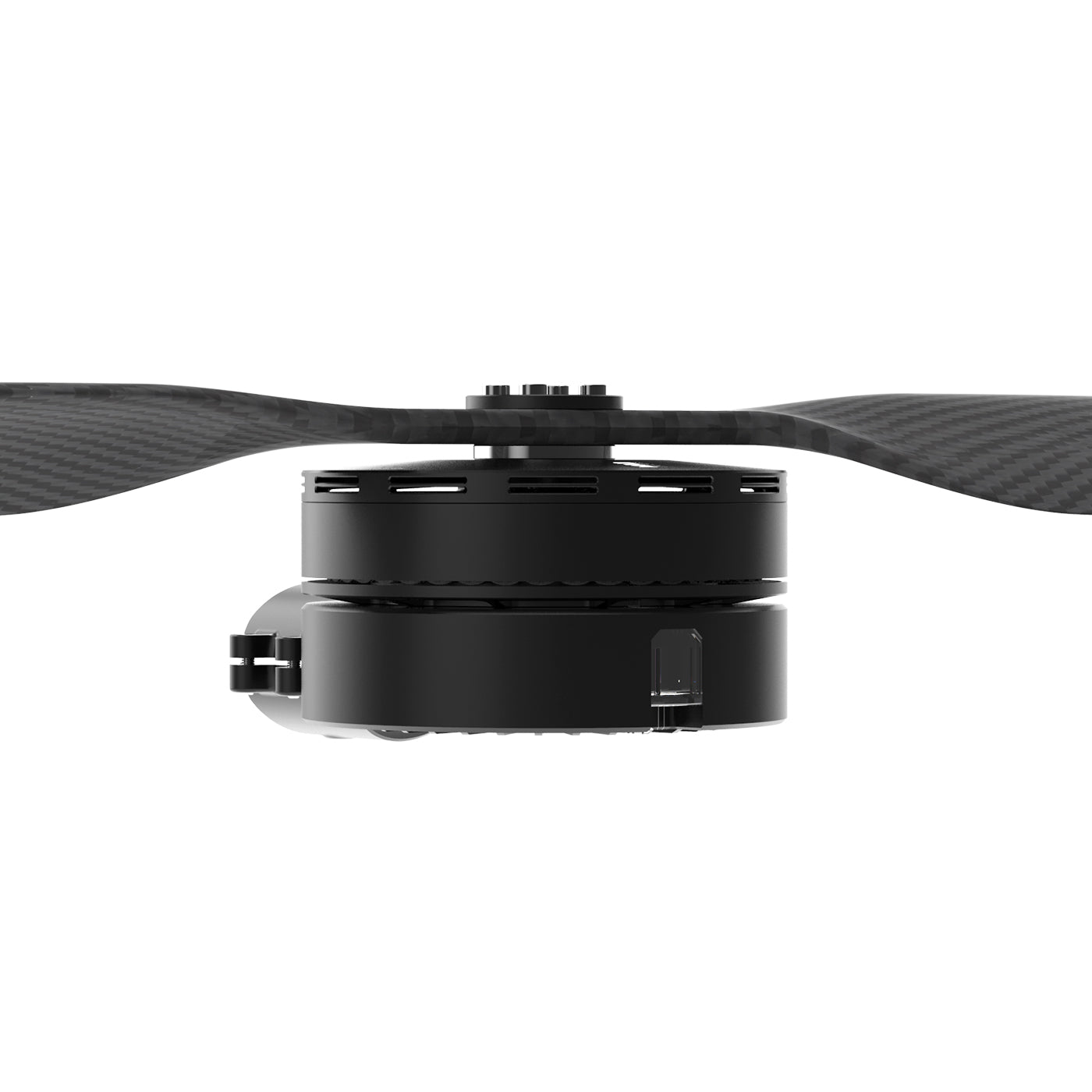 MAD 9x-12 Drone Arm, Close-up side view of a drone brushless motor with a carbon fiber propeller mounted on top