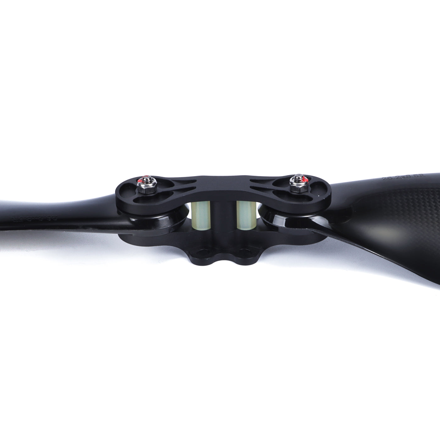 Close-up of a glossy carbon fiber folding propeller with central hub, bolts, and two black blades