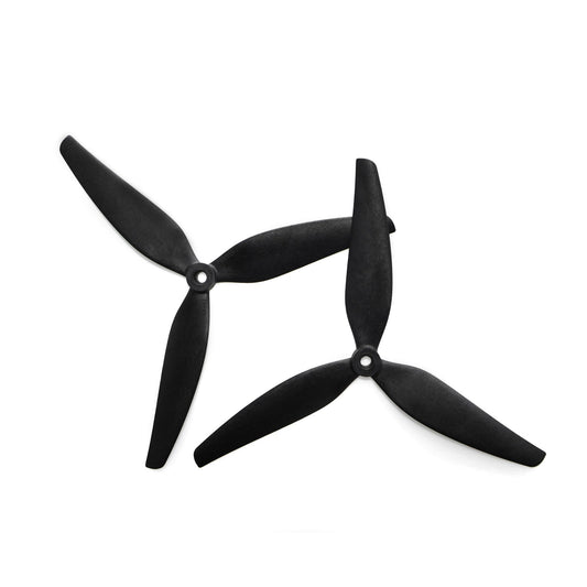 Black tri-blade drone propellers, pair shown with center hubs