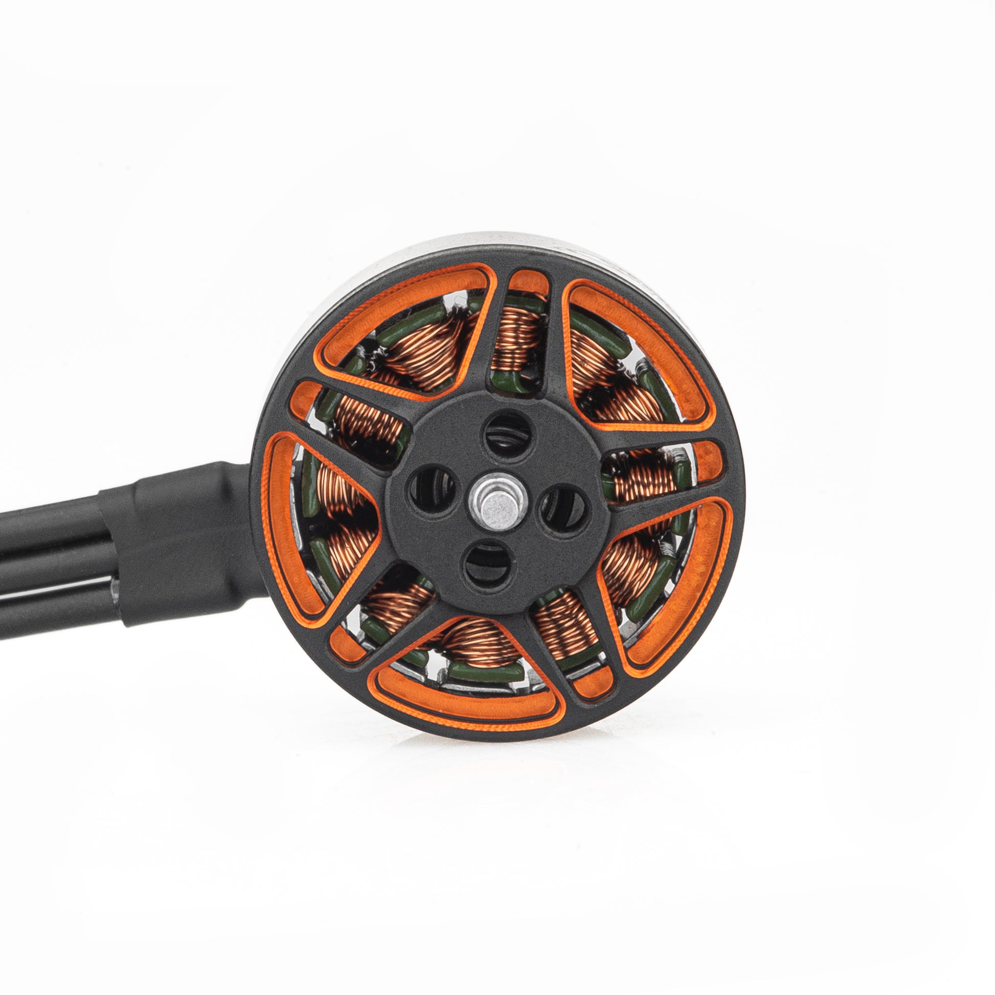 Top view of SPARK 1505 brushless motor showing rotor spokes, copper windings, and attached motor wires
