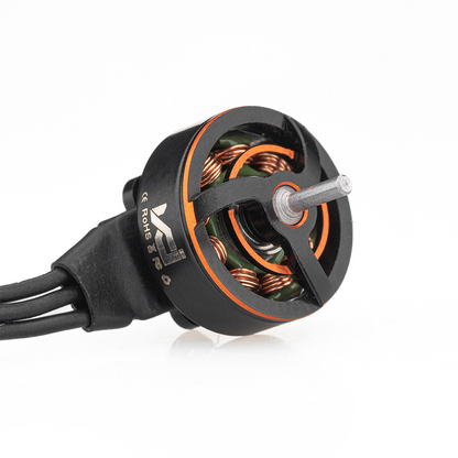 Angled view of VCI SPARK 0802 motor showing exposed copper windings, shaft, and three power wires