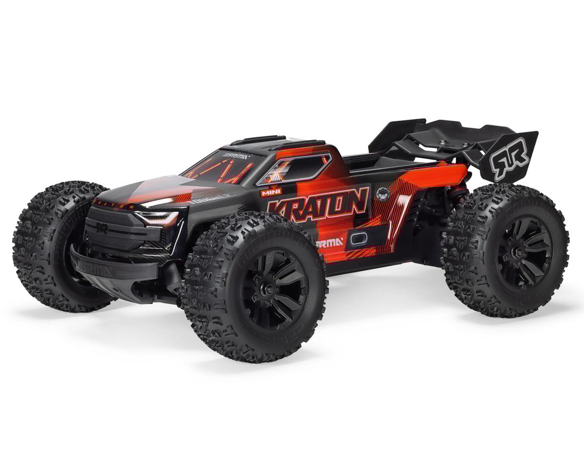 ARRMA Mini Kraton 1/16 RC monster truck in black and red with large knobby tires and rear wing