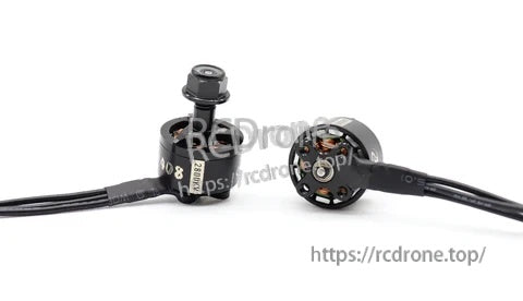 ATOMRC 1408 brushless outrunner opened to show stator windings and rotor bell, with soldered lead wires