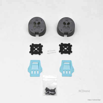 Mounting hardware kit with round black mounts, X plates, blue brackets and screw bag for RC plane
