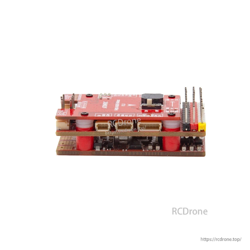 ATOMRC F405 NAVI Delux V1.1 flight controller side view showing stacked boards, standoffs, and header pins