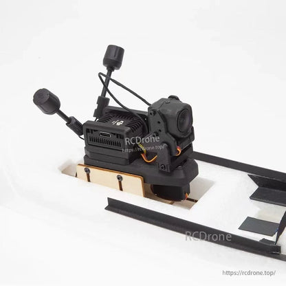 ATOMRC Quick-release Servo Gimbal placed in foam cutout tray, camera and antenna visible