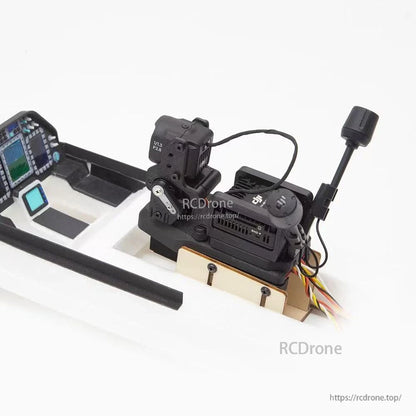 Top view of gimbal setup on foam board, showing wiring harness and mounted module