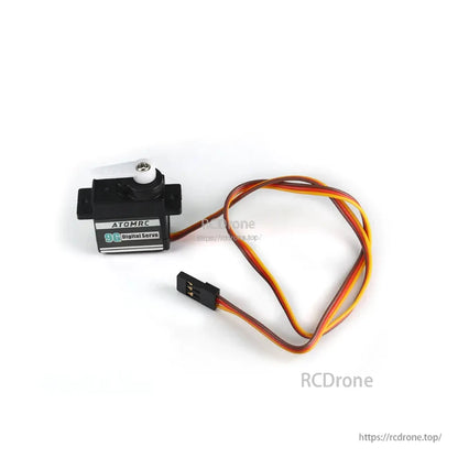 Angled servo view highlighting 3-pin connector end and three-color wire lead