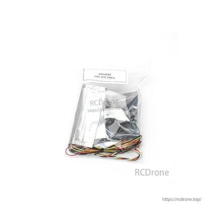 Sealed ATOMRC FPV Lite Pack bag with included components and multicolor wiring harness visible