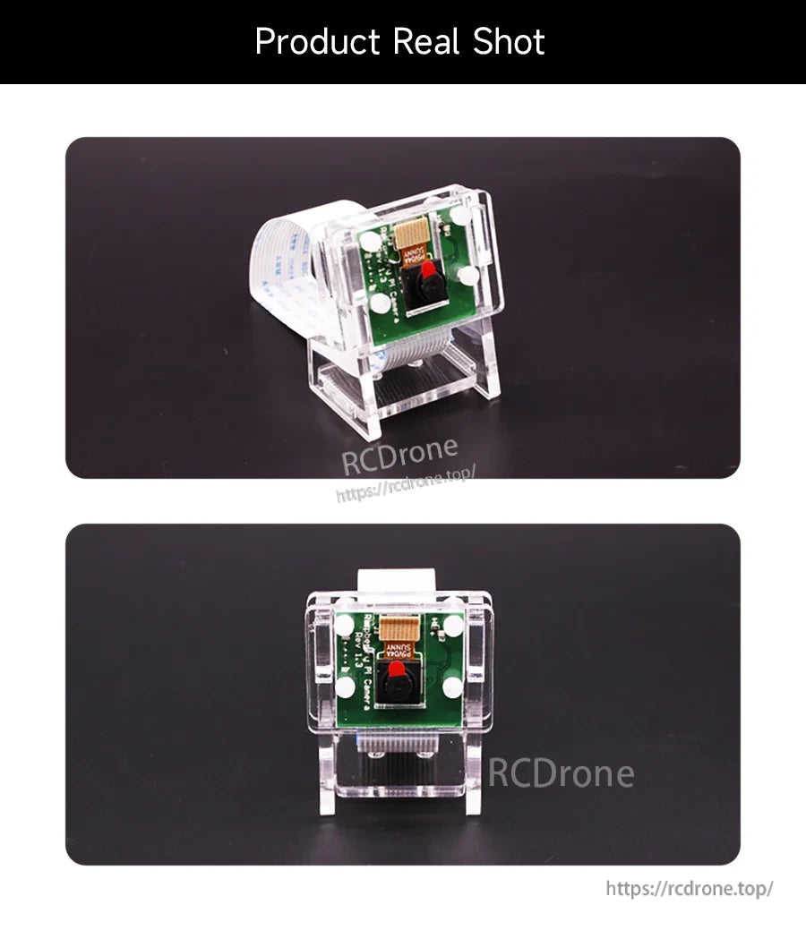 Clear acrylic camera case and stand shown from angled and front views with ribbon cable opening