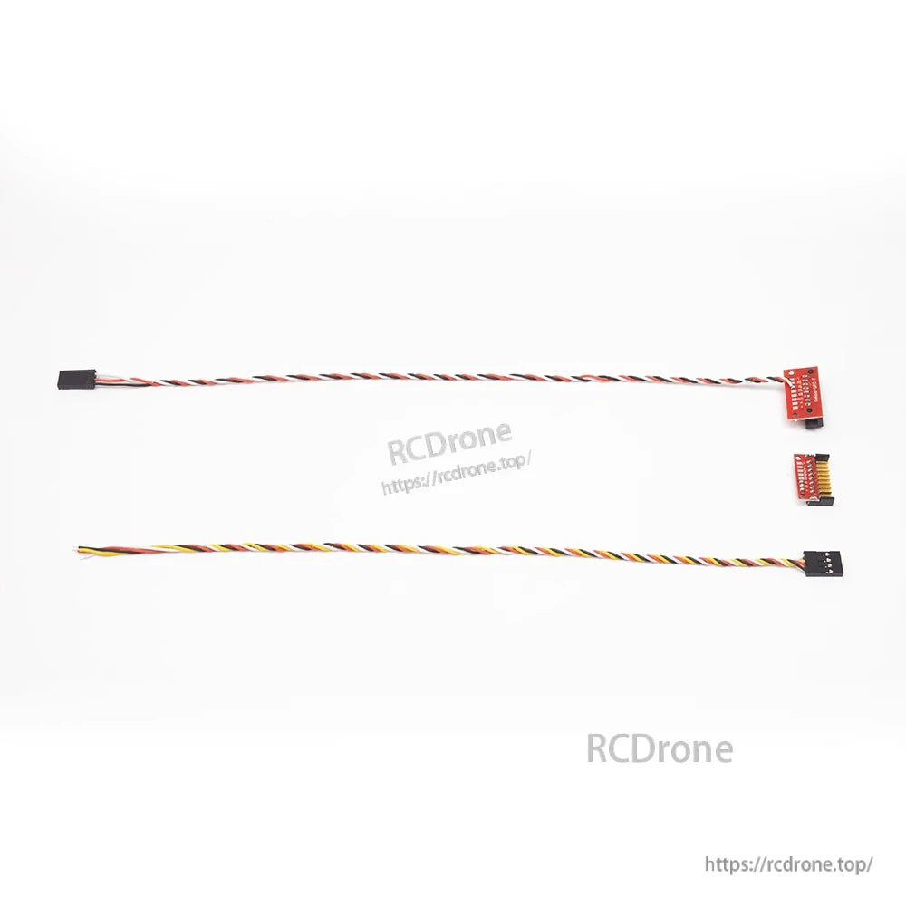 Two long servo extension cables with connectors and small red adapter board for RC plane wiring
