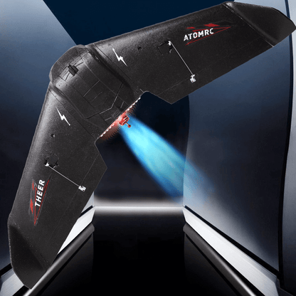 ATOMRC THEER Bat flying wing in flight with rear pusher motor thrust effect, black EPP airframe