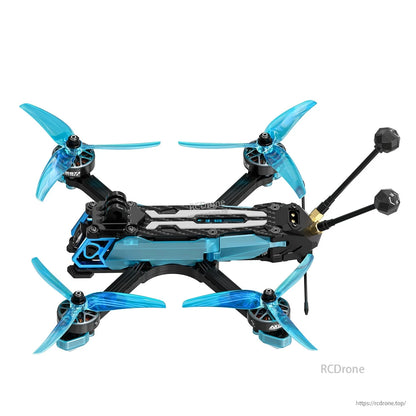 Axisflying Manta 5 SE V2 squished X FPV drone with blue tri-blade props, compact frame, and dual antennas