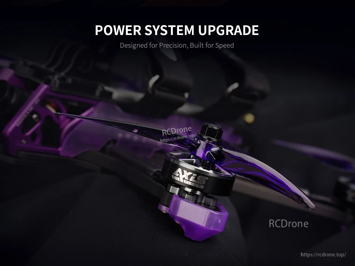 Close-up of Axisflying Manta 5 SE V2 FPV drone motor with purple propeller and purple frame hardware