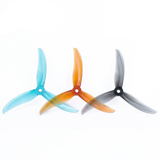 Axisflying BlackBird V3 BB39 freestyle tri-blade drone props in translucent blue, orange, and smoke gray