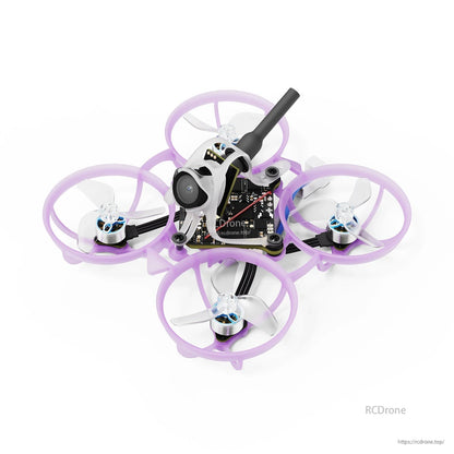 BETAFPV micro FPV whoop drone with purple prop guards, four motors, front camera, and top antenna