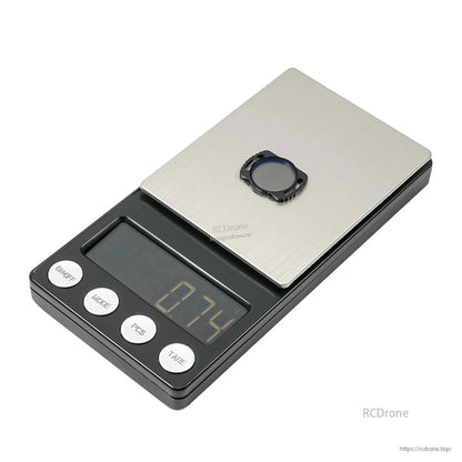 Single DJI O3 camera filter placed on a digital scale display showing 0.24 reading